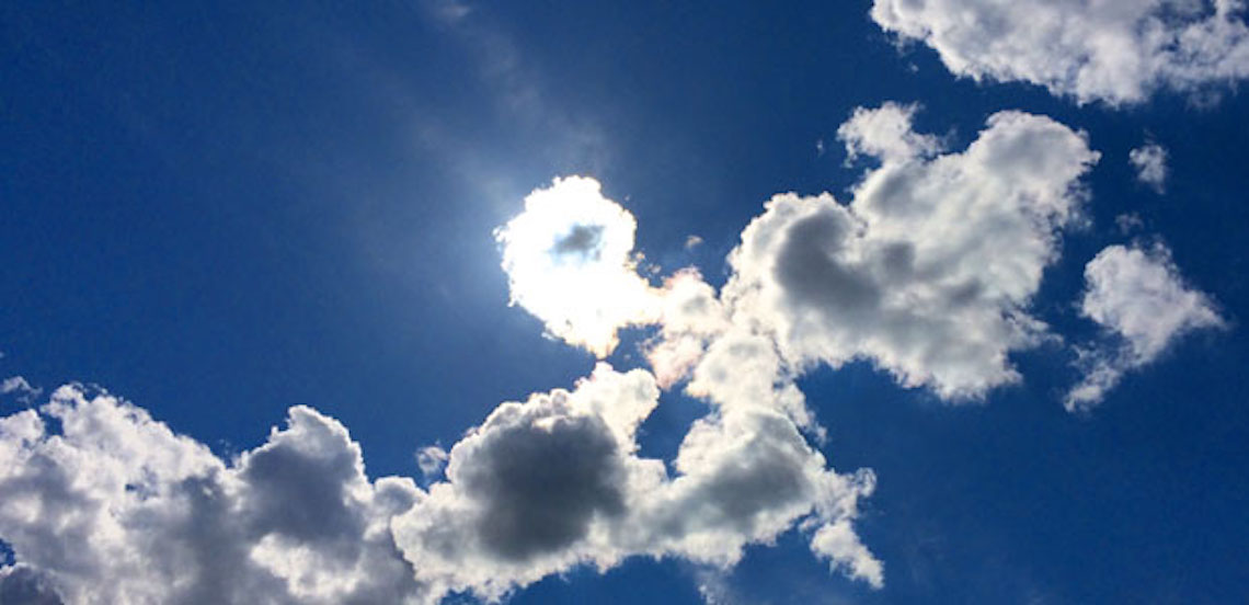 Sun behind clouds